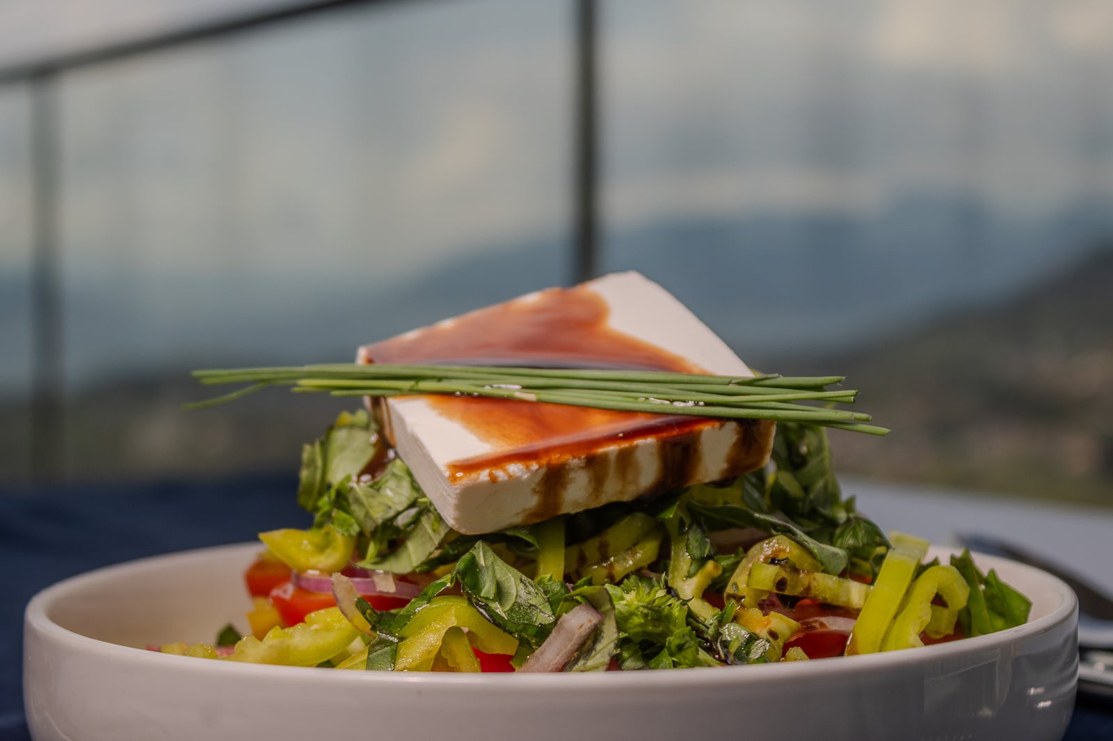 A fresh salad topped with feta at Cielo
